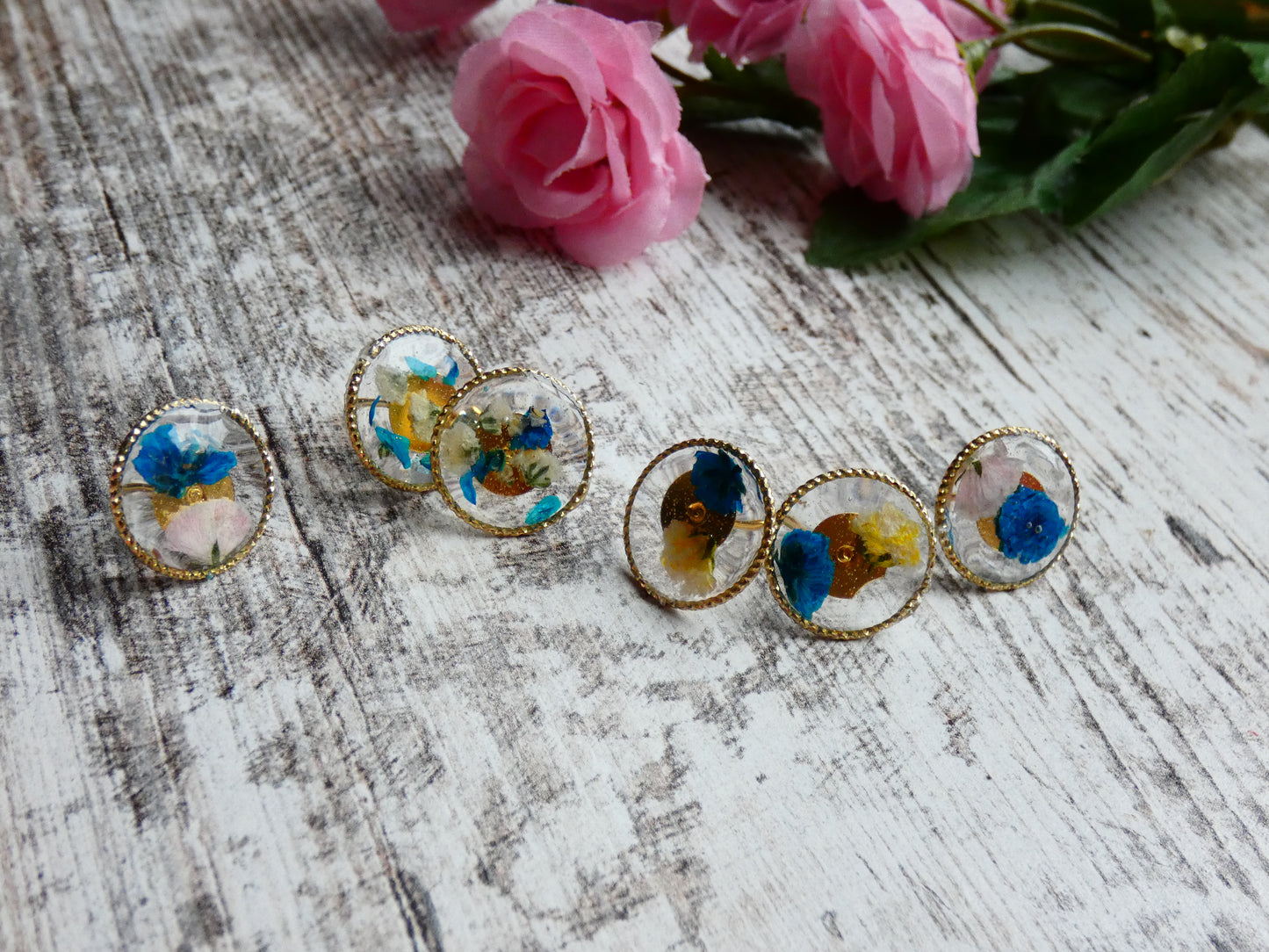 Small circle studs filled with flowers